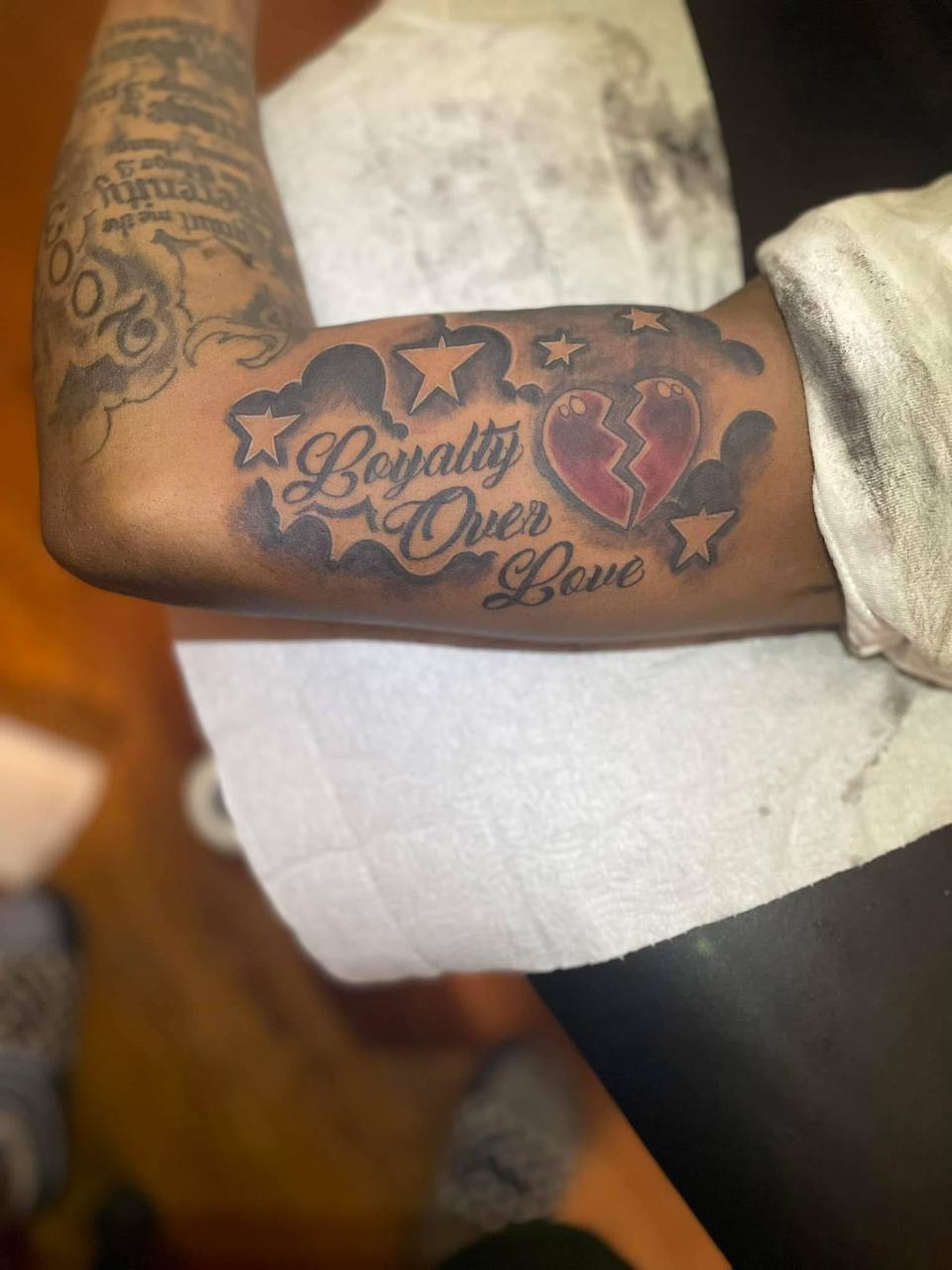 Custom lettering tattoo by 1 Stop Shop